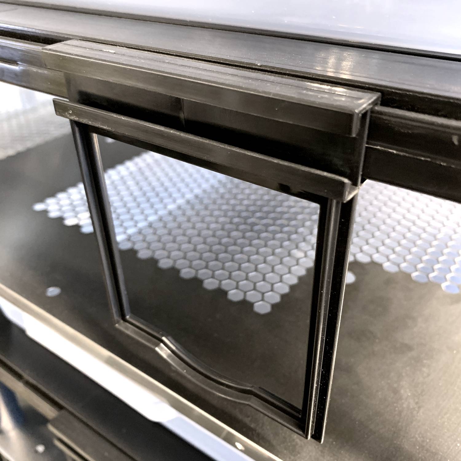 Vision Products rodent rack water bottle holder on a rack