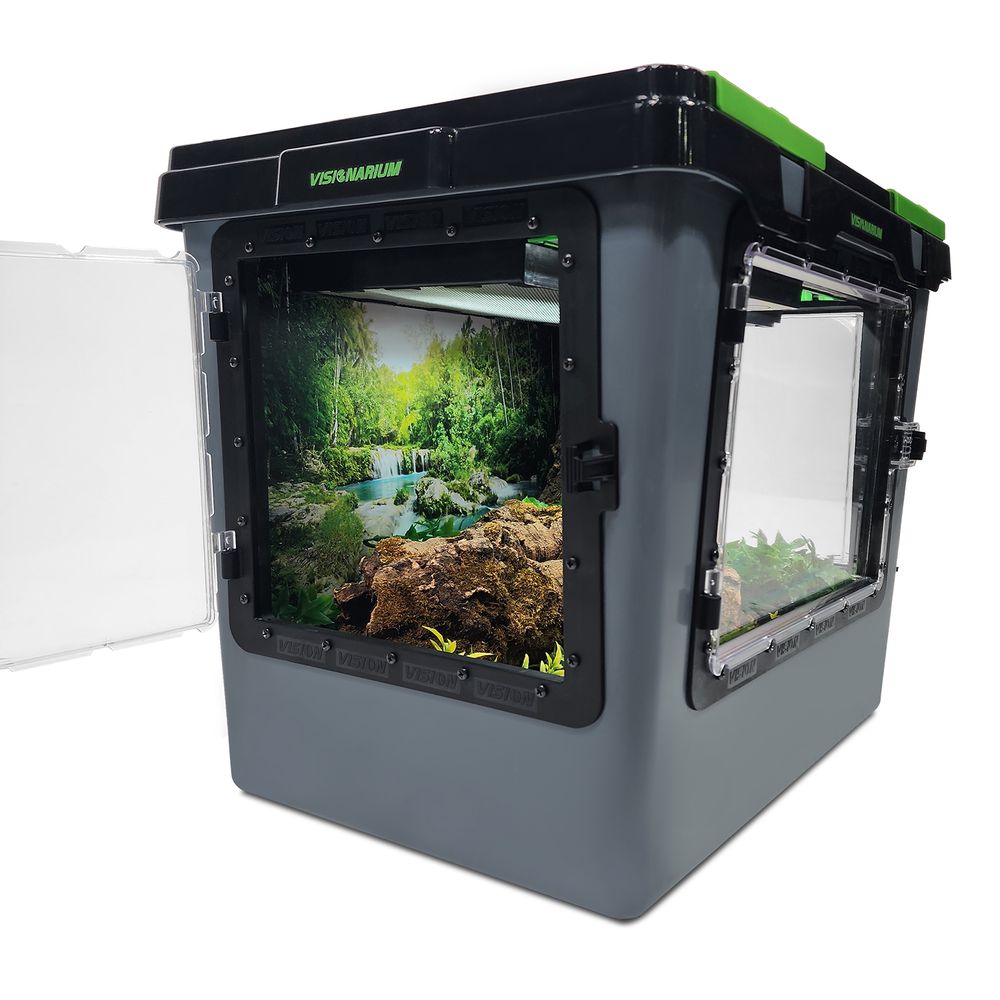 angled view of a V35-3x Visionarium reptile enclosure with natural decor and an open door